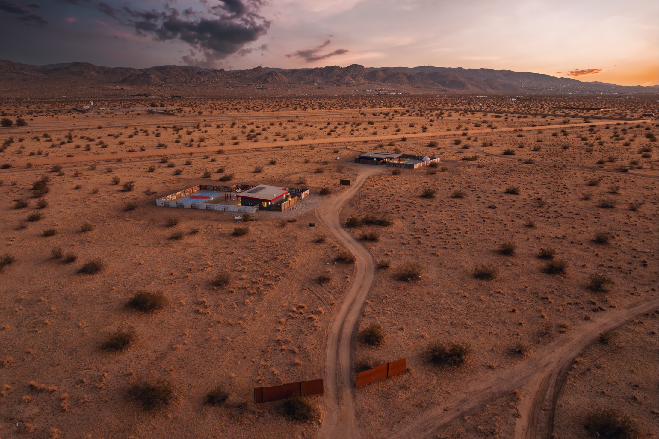 Night & Rain desert properties at sunset, aerial view